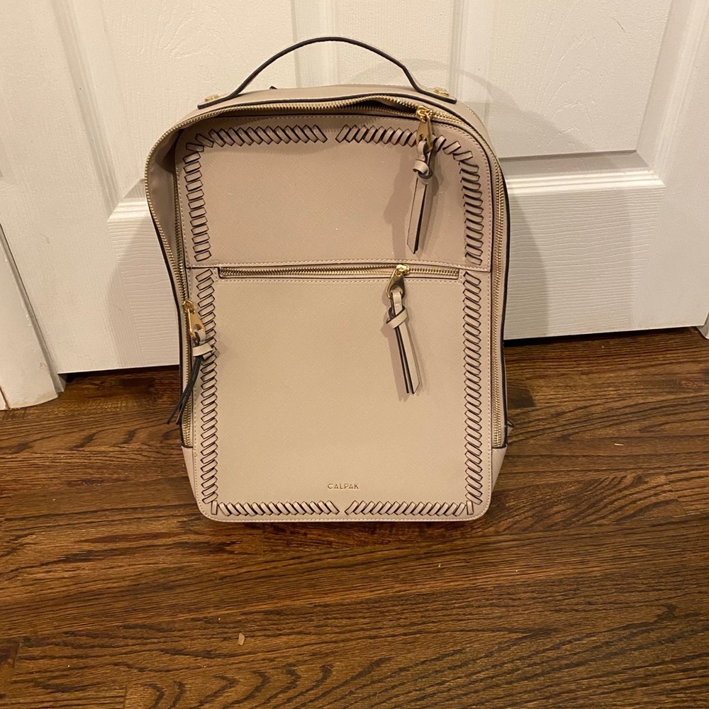 Calpak backpack- rose/blush color